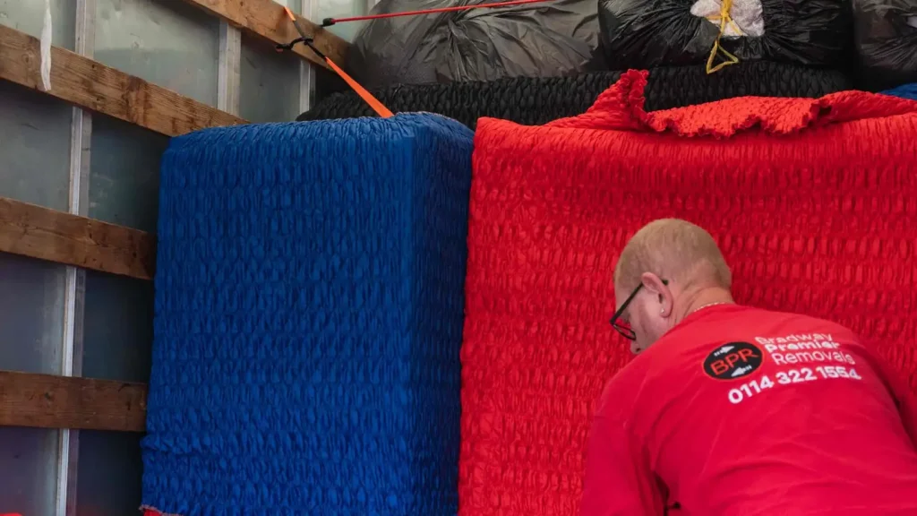 Furniture wrapped in protective covers and secured in a Bradway Premier Removals lorry, as included in a standard removal quote
